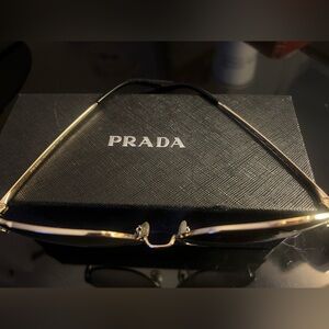 Prada Women's Sunglasses with Gold Frame